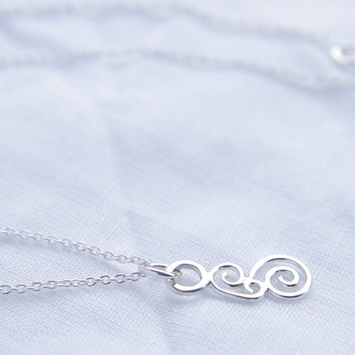 Swirls necklace on silver chain