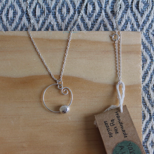 Swirly bubble necklace on 60cm chain