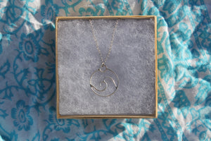 Swirled wave charm necklace