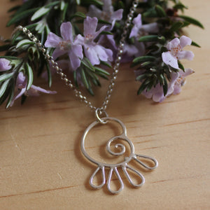 Spiralling petals necklace